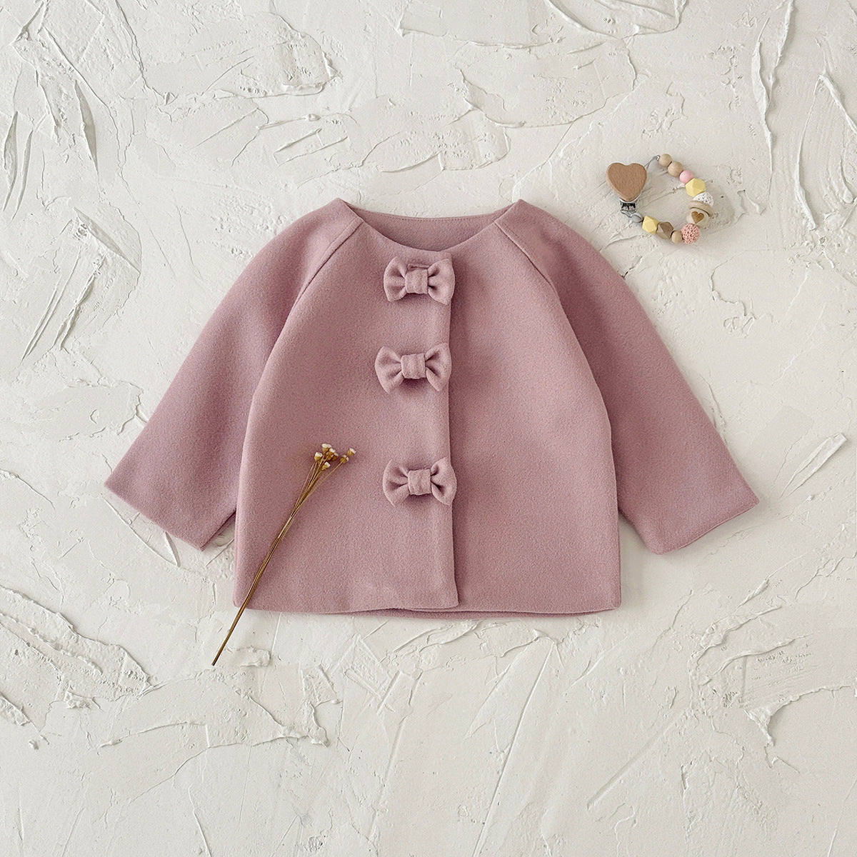 Girls' pink woolen coat with bow decoration and snap button children's clothing